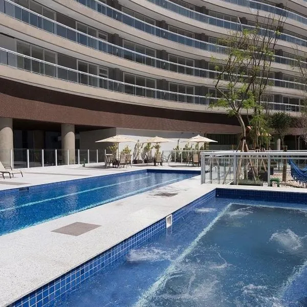 Studio moderno em condomínio de luxo pé na areia