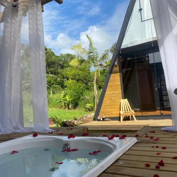 Cabana da reserva com jacuzzi